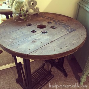 Upcycled Singer Spool and Electrical Spool Table at Front Porch Mercantile