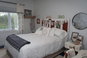 Stunning master bedroom using re loved and re styled decor, paint changes everything