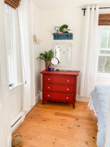 Front Porch Mercantile guest room makeover - red dresser in milk paint